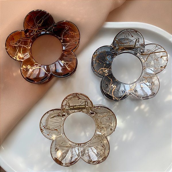 PRESILHA FLOR TRANSPARENTES DESENHOS DOURADOS