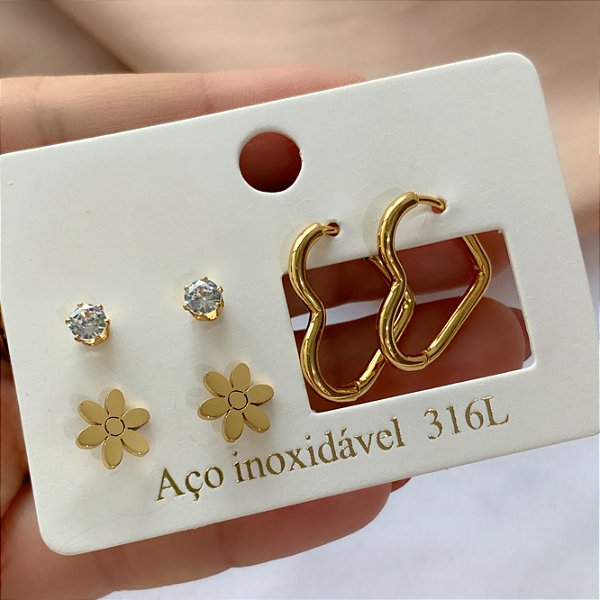 BRINCO KIT ARGOLA CORAÇÃO, FLOR E ZIRCÔNIA DOURADO AÇO 316L⭐️