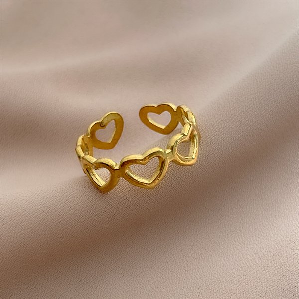 ANEL REGULÁVEL CORAÇÕES ENFILEIRADOS VAZADOS DOURADO AÇO 316L⭐️
