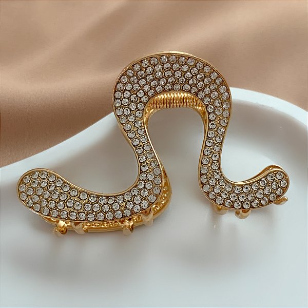PRESILHA UNITÁRIA ONDA STRASS DOURADO BIJU