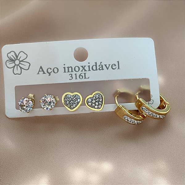 BRINCO KIT ARGOLINHA E CORAÇÃO ZIRCÔNIAS E PONTO DE LUZ DOURADO AÇO 316L⭐️