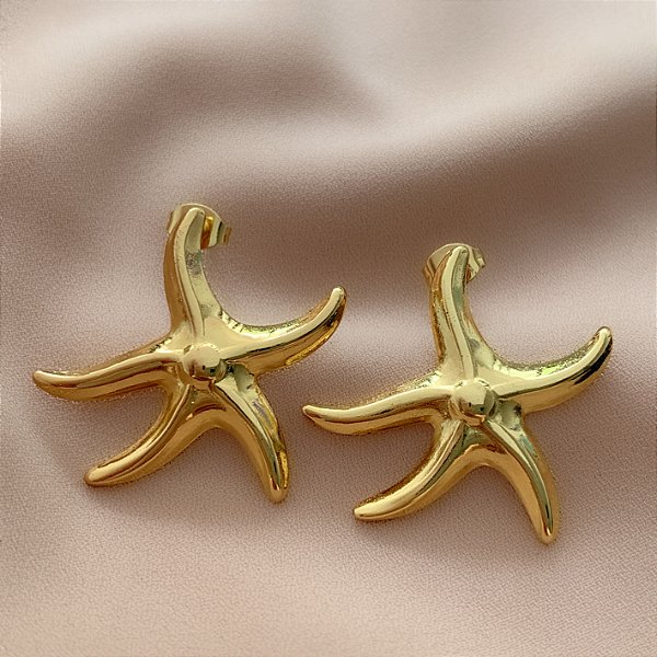 BRINCO ESTRELA DO MAR LISA CURVA DOURADO AÇO 316L⭐️
