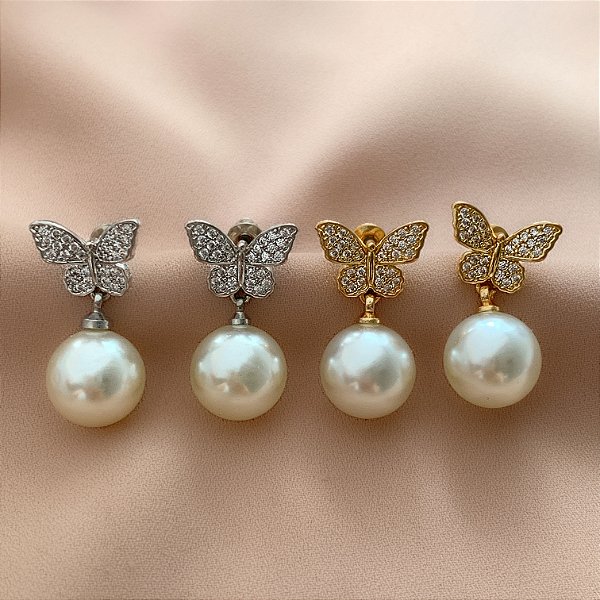 BRINCO BORBOLETA CRAVEJADA EM ZIRCÔNIAS E PÉROLA BIJU