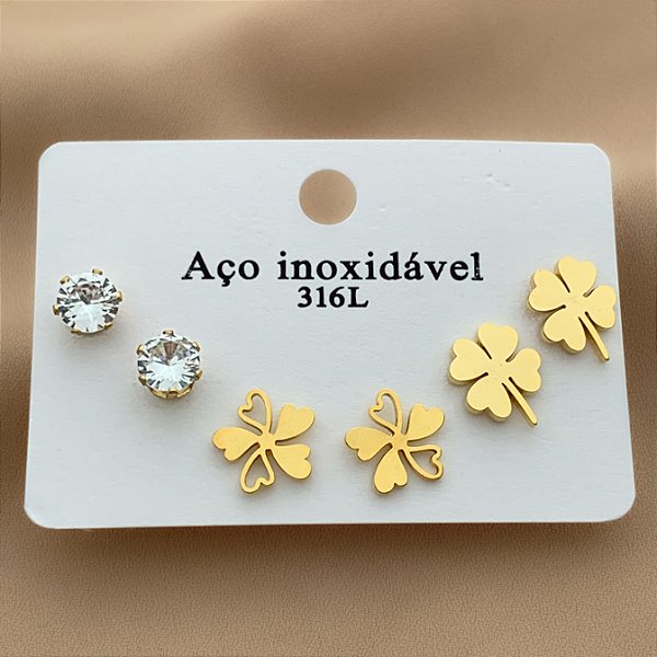 BRINCO KIT TREVOS E PONTO DE LUZ DOURADO AÇO 316L⭐️