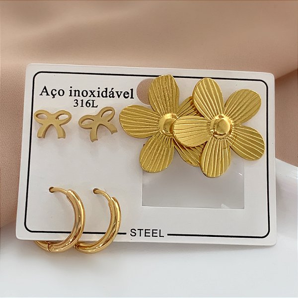 BRINCO KIT FLOR E LAÇO DOURADO AÇO 316L⭐️