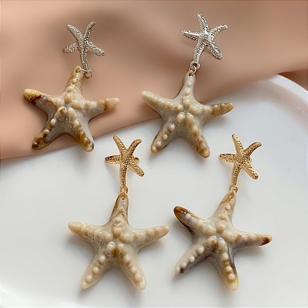 BRINCO ESTRELA DO MAR EM RESINA PENDENTE BIJU