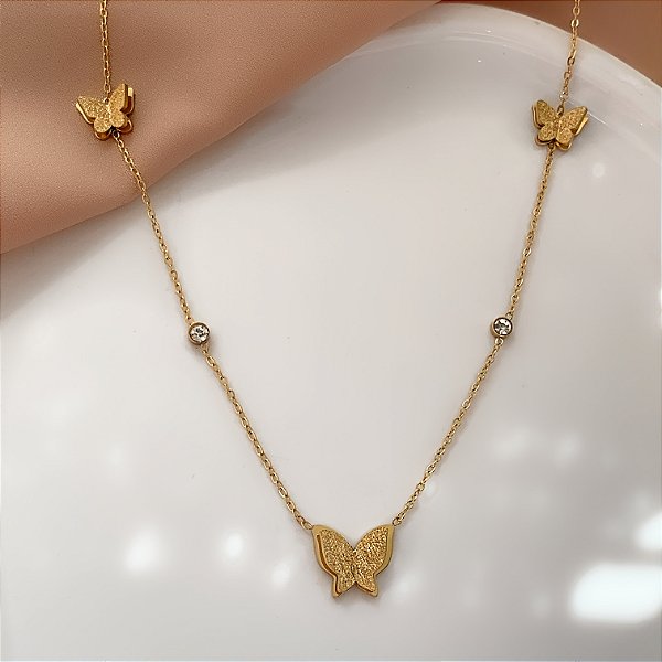 COLAR BORBOLETAS JATEADAS E ZIRCÔNIAS DOURADO AÇO 316L⭐️