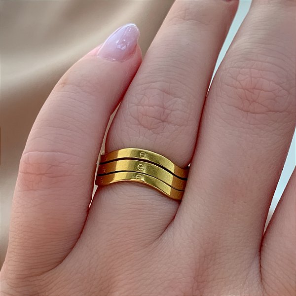 ANEL ONDAS SUBLIME DOURADO AÇO 316L⭐️