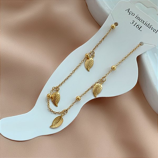 TORNOZELEIRA MINI FOLHAS DOURADO AÇO 316L⭐️