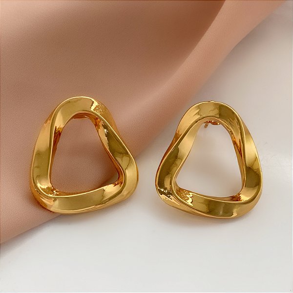 BRINCO FORMATO ABSTRATO TORCIDO DOURADO AÇO 316L⭐️
