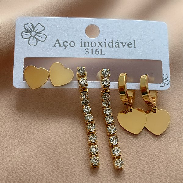 BRINCO KIT ARGOLINHA CORAÇÃO E PENDENTE ZIRCÔNIAS DOURADO AÇO 316L⭐️