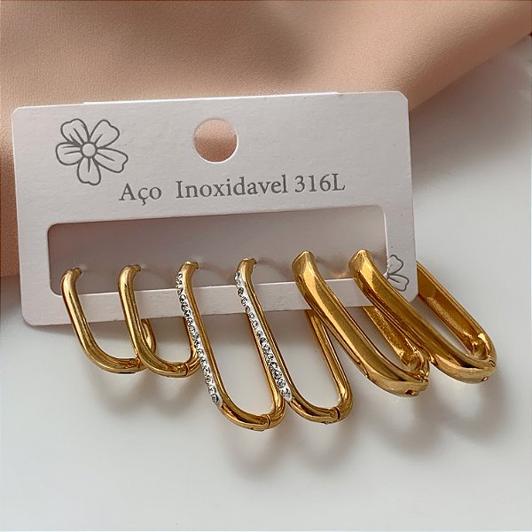 BRINCO KIT ARGOLINHAS RETANGULARES BORDAS BOLEADAS LISAS E ZIRCÔNIAS DOURADO AÇO 316L⭐️
