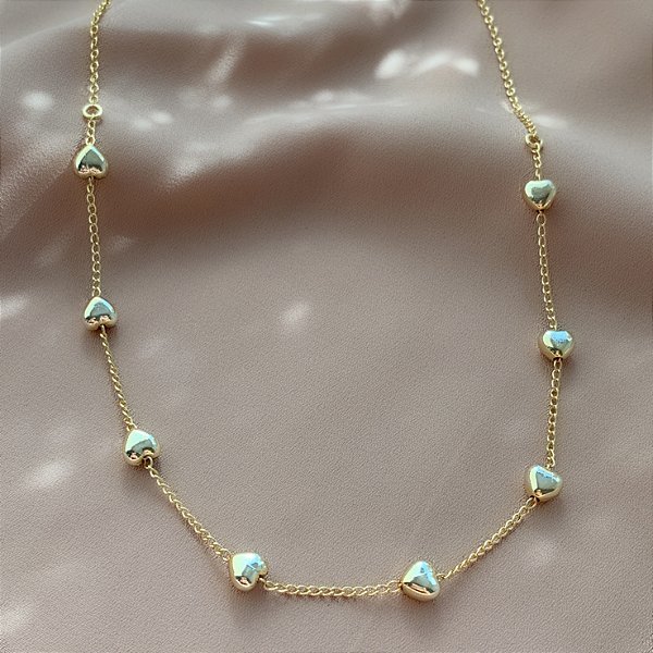 COLAR MINI CORAÇÕES BOLEADOS FOLHEADO A OURO 18K⭐