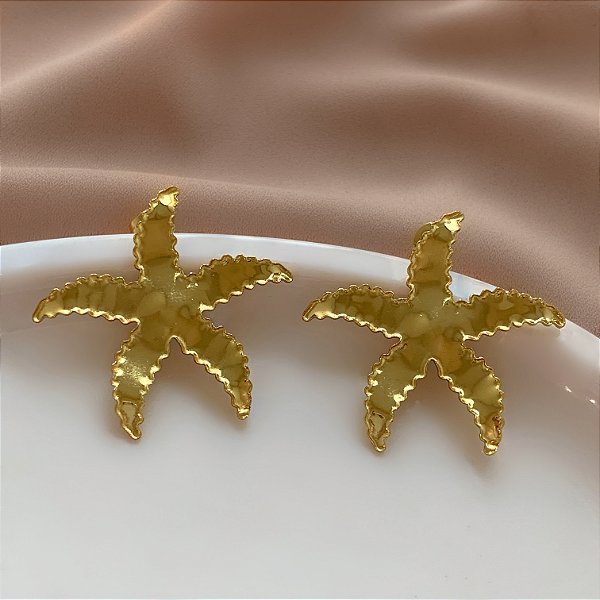 BRINCO ESTRELA DO MAR BORDA FRANZIDA DOURADO AÇO 316L⭐️