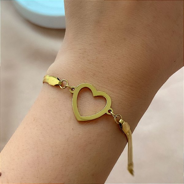 PULSEIRA FITA CORAÇÃO VAZADO DOURADO AÇO 316L⭐️