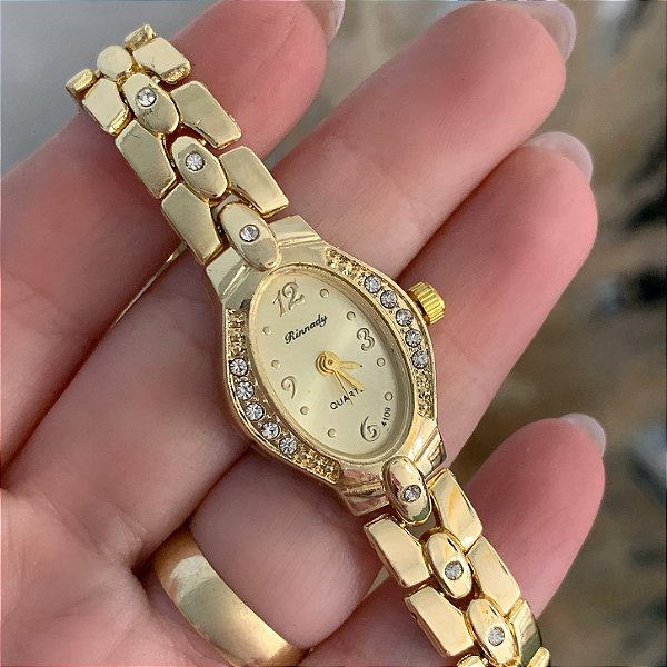 RELÓGIO FEMININO OVAL COM STRASS DOURADO BIJU