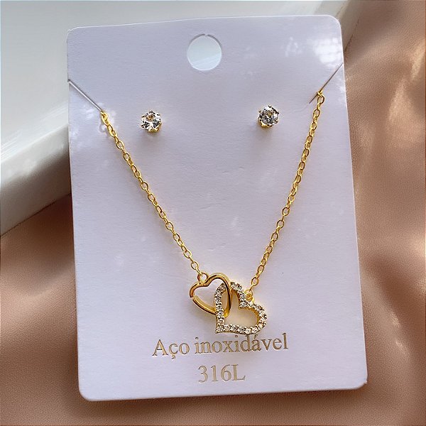 CONJUNTO COLAR E BRINCO CORAÇÕES ENTRELAÇADOS ZIRCÔNIAS DOURADO AÇO 316L⭐️