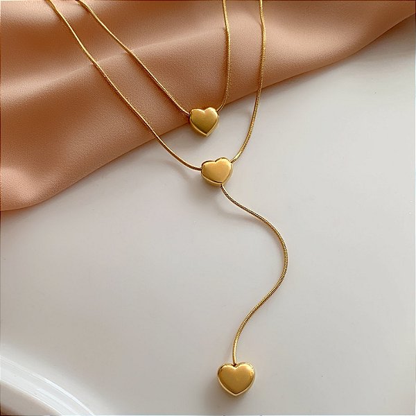 COLAR DUPLO ESTILO GRAVATINHA CORAÇÃO ACHATADA DOURADO AÇO 316L⭐️