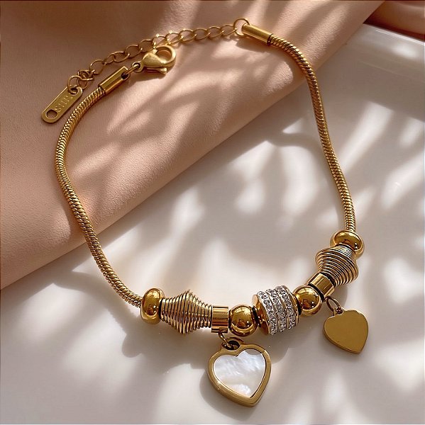 PULSEIRA PINGENTES CORAÇÃO MADREPÉROLA E ZIRCÔNIAS DOURADO AÇO 316L⭐️