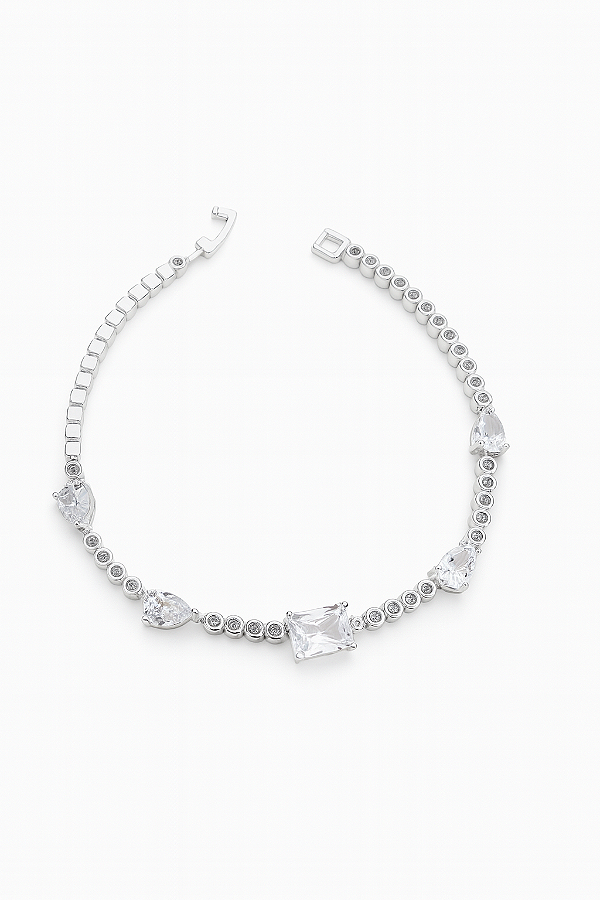 Pulseira riviera com zircônia retangular e gota banhada a prata