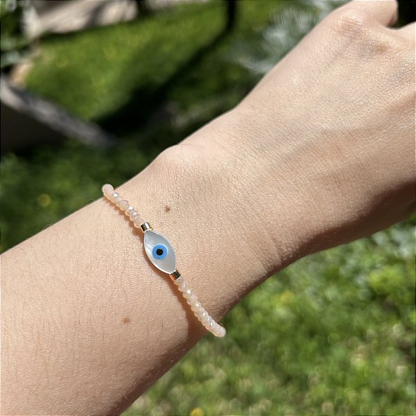 Pulseira silicone cristais beges e olho grego