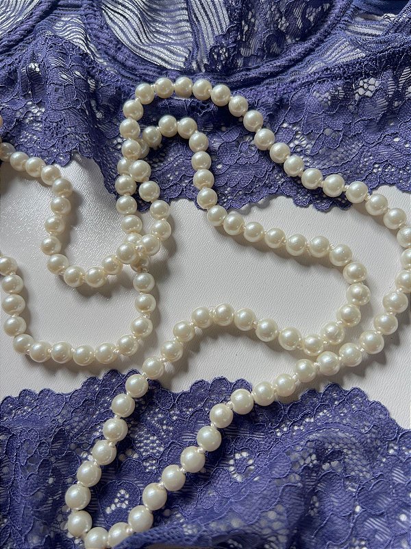 Colar de perólas para massagem