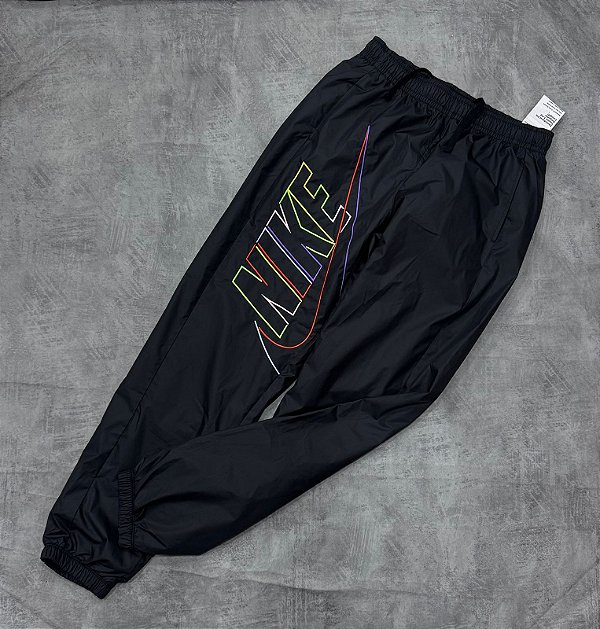 Calça nike art color tac tel
