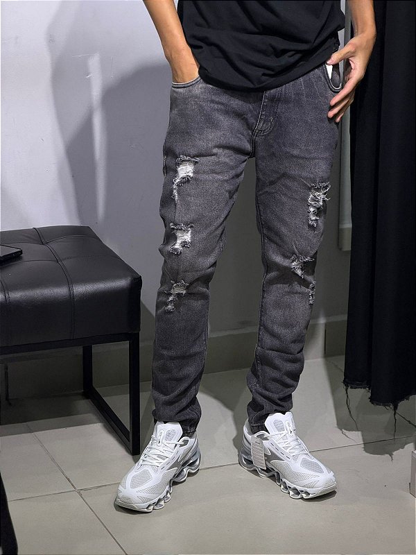 Calça jeans jogador botao branco