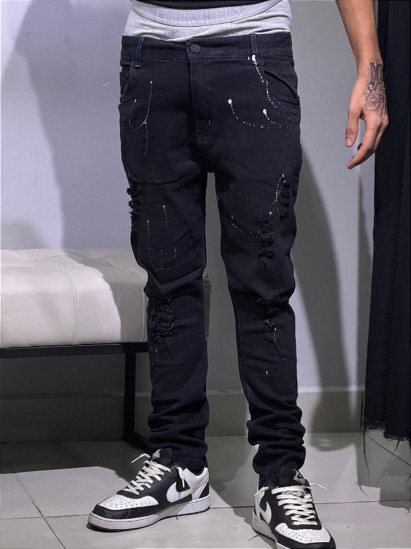 Calça Metal Jeans escura com respingo de tinta