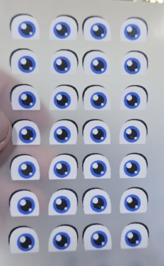 Olhinhos em DTF "ROBÔ AZUL" cartela com 14 pares