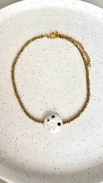 Chocker hematita dourada com pingente pérola Shel