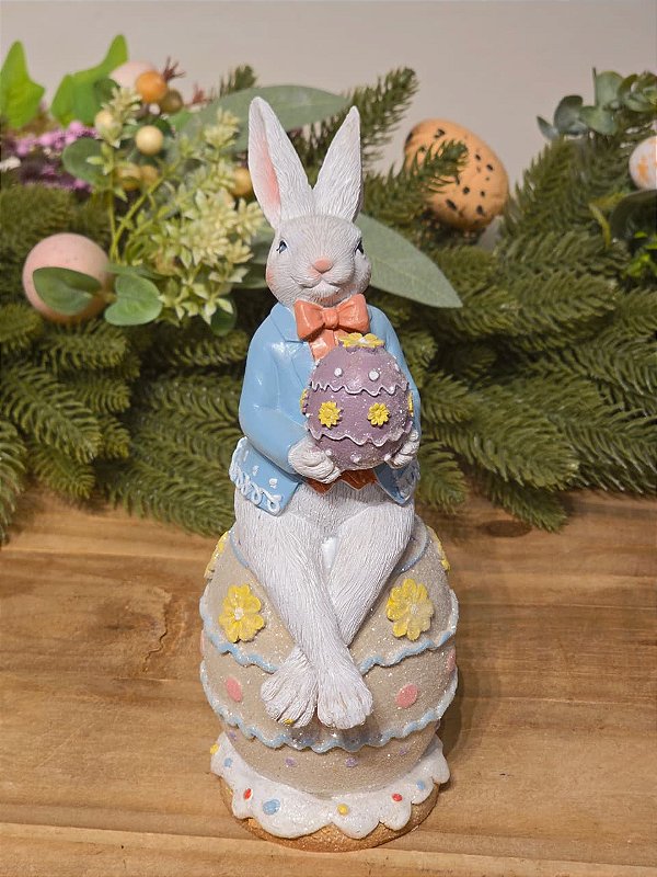 COELHO SENTADO EM CIMA DO OVO 22CM