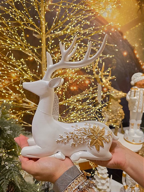 RENA DEITADA COM POINSETIA DOURADA EM RESINA 27CM - PRÉ VENDA 2026