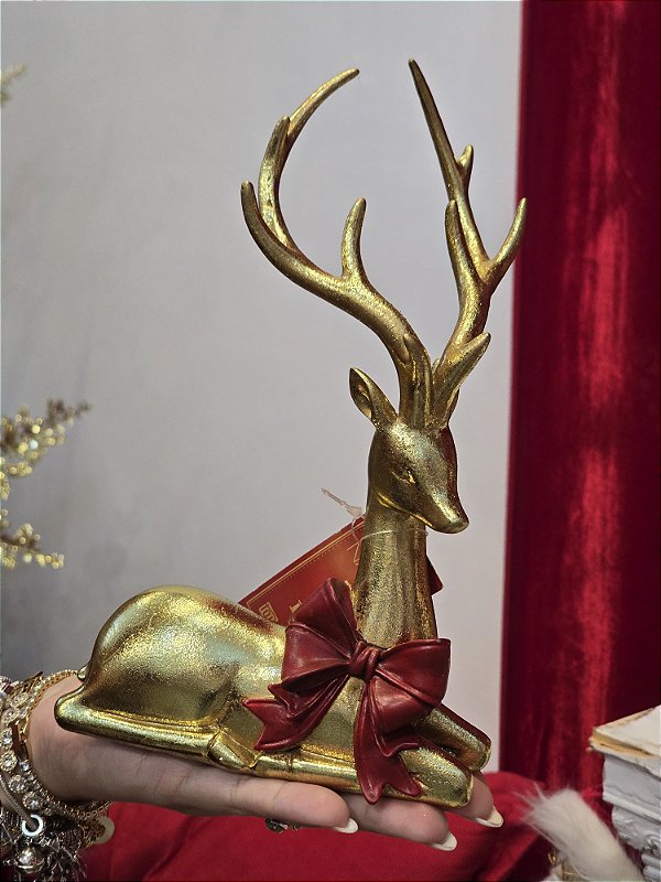 RENA DEITADA DOURADA COM LAÇO VERMELHO 22CM - PRÉ VENDA 2026
