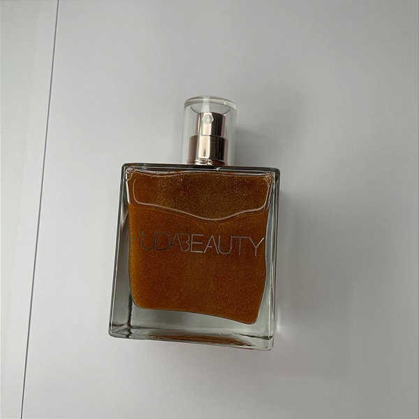 Huda Beauty N.Y.M.P.H Body Drip Shimmering Dry Body Oil (Sem caixa)