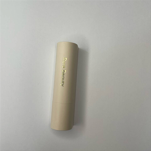 Rare Beauty Dewy Lip Balm | Cor: Blessed (sem caixa, pequeno detalhe na bala)