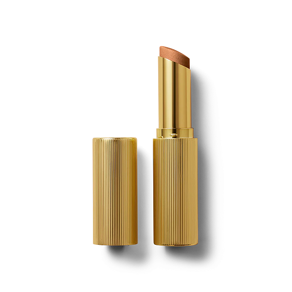 Iluminador em Stick Victoria Beckham Reflect Highlighter Stick | Cor: Amber
