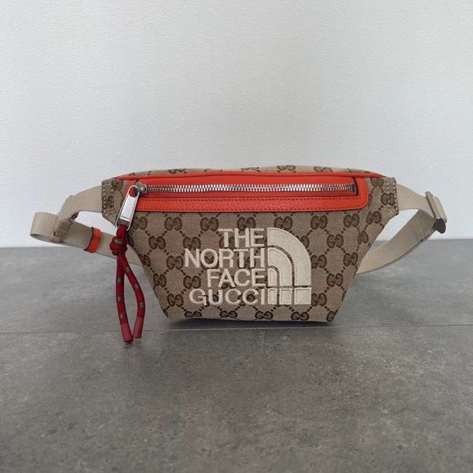 Pochette Gucci x The North Face "GG Supreme/Orange"