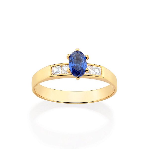Anel Solitário Composto Por 4 Zircônias Carrê De 2X2 Mm E 1 Zircônia Oval De 4X6 Mm Ao Centro Rommanel