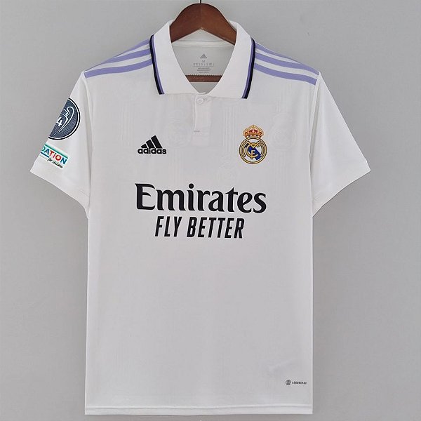 Nova Camisa Real Madrid 1 Patch UEFA Champions League Torcedor Masculina 2022 / 2023