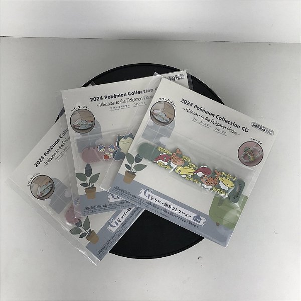 PULSEIRA DE PRENDER CABOS/FIOS ALEATÓRIA POKEMON ICHIBAN KUJI LETRA G BANDAI 100% ORIGINAL LACRADO