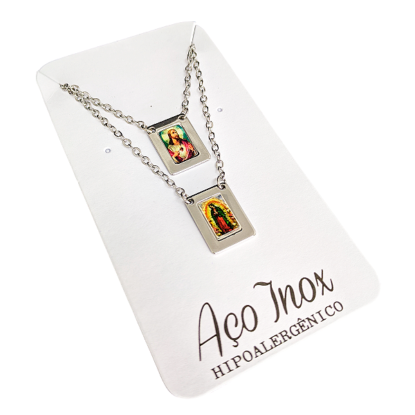 Escapulário em aço na cartela - Sagrado Coração de Jesus e Nossa Senhora de Guadalupe - O Pacote com 6 unidades - Cód.: 8970