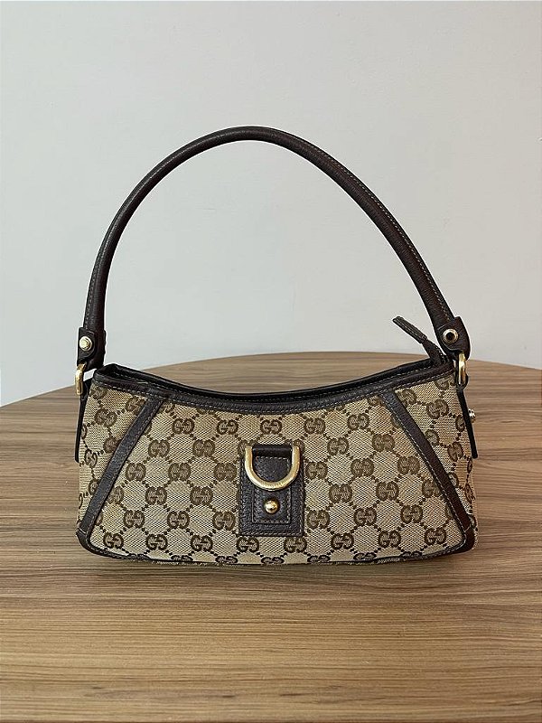 Bolsa Gucci Baguette Canvas