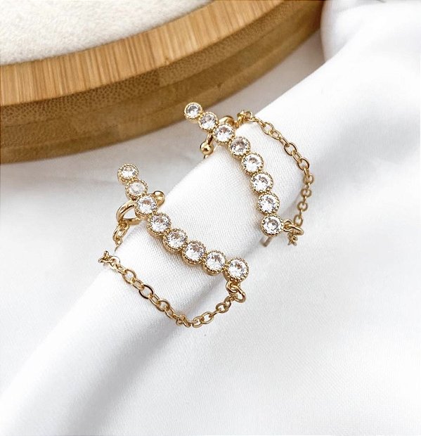 Brinco FABIA ear hook cravejada com zircônia folheada a ouro