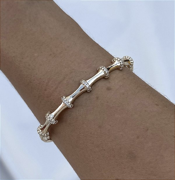 Bracelete IZADOCK cravejada com microzirconia folheada a ouro