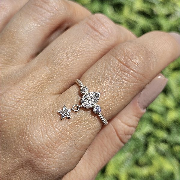 ANEL DE PRATA TRABALHADO COM SOLITARIO MICRO CRAVEJADO DE ZIRCÔNIAS BRANCAS E PINGENTE DE ESTRELA