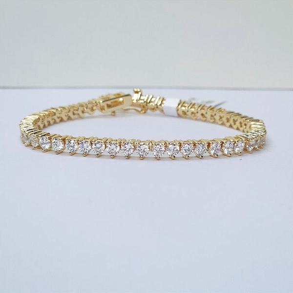 PULSEIRA DOURADA MODELO RIVIERA 3 PONTAS COM ZIRCÔNIAS BRANCAS E FECHO GAVETA