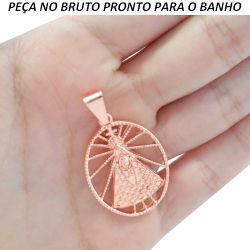 PINGENTE NO BRUTO PRONTO PARA O BANHO JA NO COBRE NOSSA SENHORA APARECIDA BAIXA FUSÃO TAMANHO APROXIMADO:3CM 22X28MM 5GR REF:BRU854
