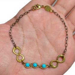 Pulseira No Bruto Pronto Para Banho Com Bolinhas Azuis Tamanho Aproximado: 21,0cm Peso: 2,3 gramas REF: BRU1884