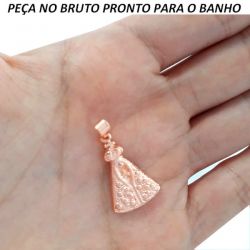 PINGENTE NO BRUTO PRONTO PARA O BANHO JA NO COBRE NOSSA SENHORA APARECIDA BAIXA FUSÃO TAMANHO APROXIMADO:3CM 18X14MM 2GR REF:BRU856